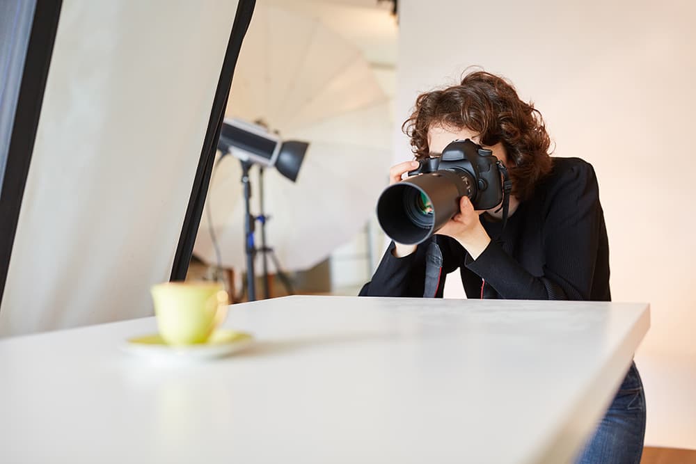 Woman taking product pictures